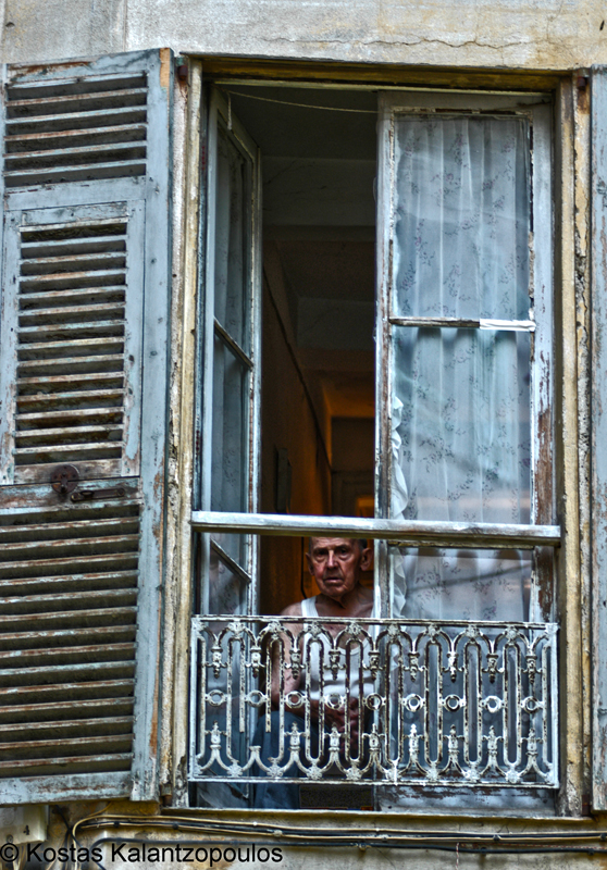 man and window